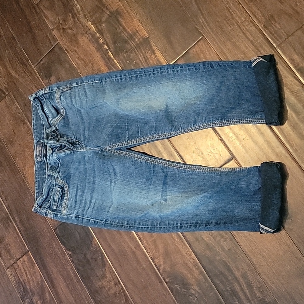 Women's silver suki style capris. Dark blue